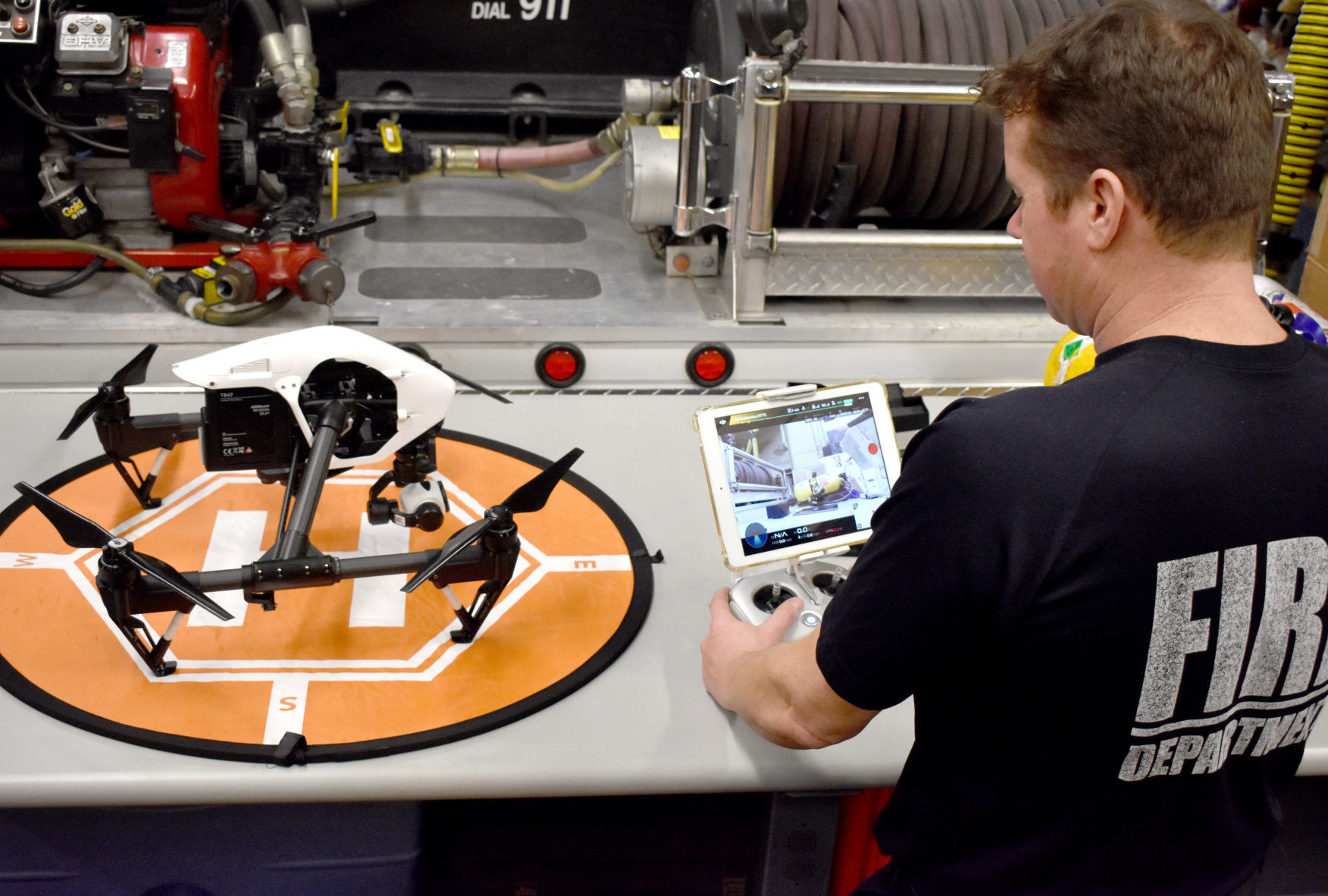 Matt Asch calibrates Portage Fire drone